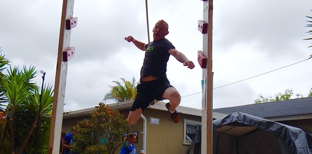 Dane Walker leaps for the salmon ladder.